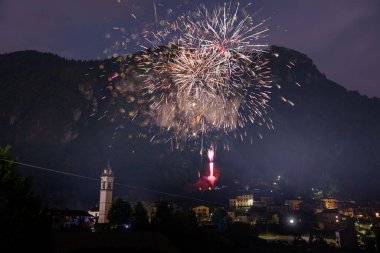 Fireworks with cornalba cliff in the background