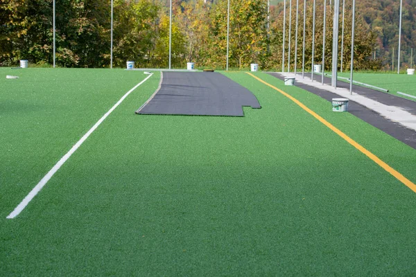 Laying Synthetic Grass Sports Center — Stock Photo, Image