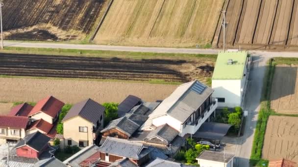 Flyover Dry Unplanted Fields Next Rural Japanese Neighborhood High Quality — Stockvideo