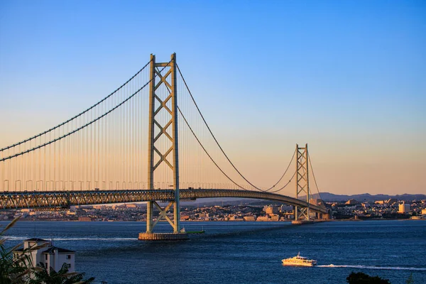 Sunset Lights Passenger Ferry Approaching Akashi Suspension Bridge High Quality — Stock Photo, Image