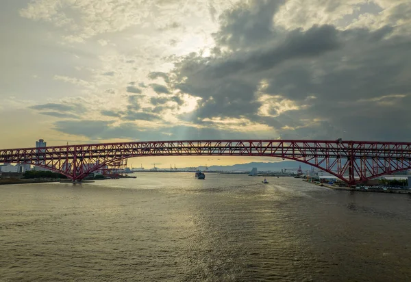 Sun Shines Clouds Bridge River Distant Cargo Ship High Quality — Stock Photo, Image