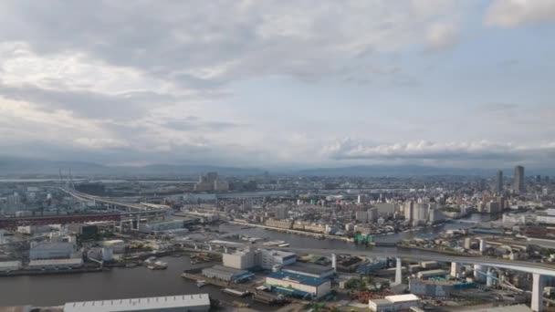 Aerial Timelapse Slide Bridges Buildings Sprawling City Sea Level High — Stockvideo