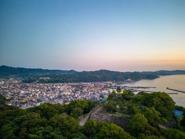 Dawn at castle overlook in small coastal town. High quality photo