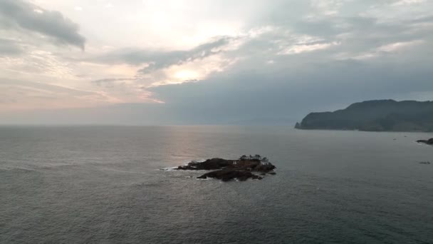 Aerial Approach Small Shrine Rocky Offshore Outcrop Sunrise High Quality — Stock video