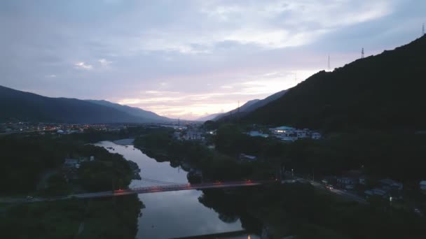 Flying Suspension Bridge River Mountain Landscape Dawn High Quality Footage — Vídeo de Stock