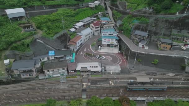 Aerial View Single Car Train Platform Station Small Mountain Village — Stock video