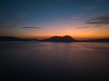 Small island mountain off coast before dawn. High quality photo