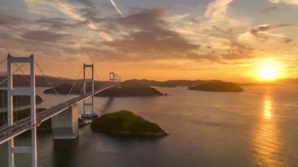 Hyperlapse Sun Sets Next Long Suspension Bridge Small Islands High — Stockvideo