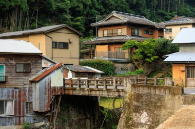 Small neighborhood in typical small Japanese country village . High quality photo clipart