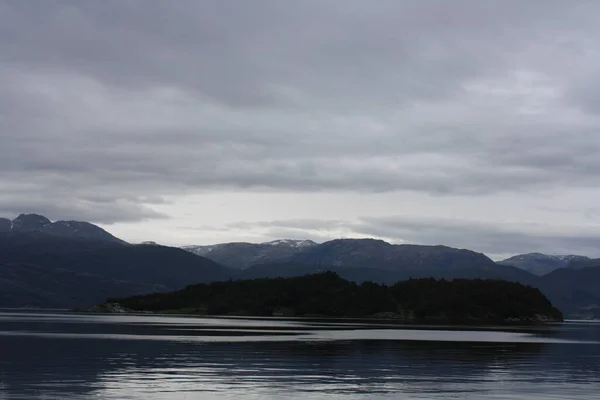 Oystese, cabins on the shores of the fjord. Norway.