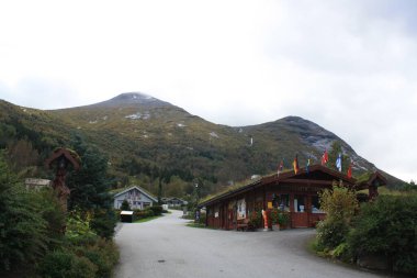 Norway, with its variety of landscapes, lakes, cabins.
