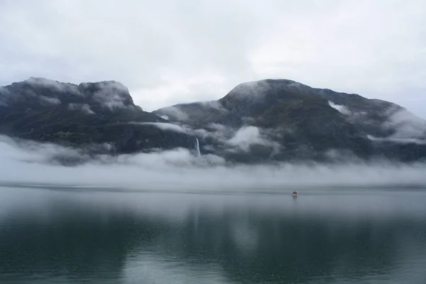 Norway, with its variety of landscapes, lakes, cabins.