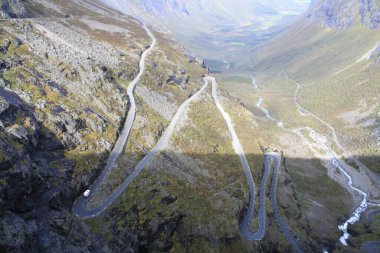 Trollstigen, Norwegian road between valleys, waterfalls and fjords.