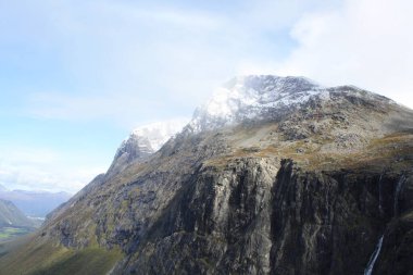 Trollstigen, Norwegian road between valleys, waterfalls and fjords.