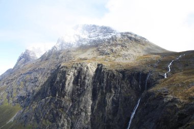 Trollstigen, Norwegian road between valleys, waterfalls and fjords.