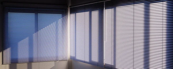 Panoramic view of White Venetian blinds with sunlight and shadow. Window blinds. 3d rendering.