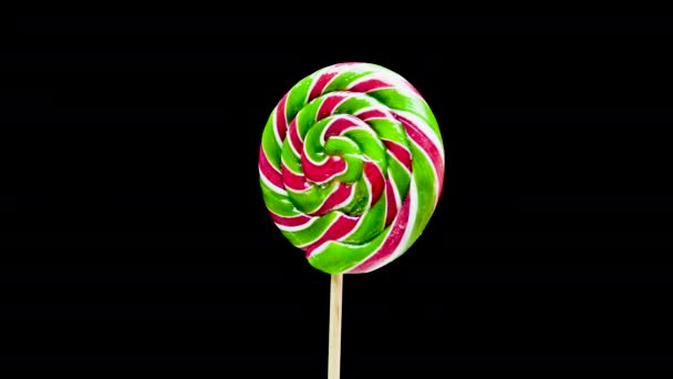 Green Lollipop Black Background Caramel Colored Candy — Stock Video