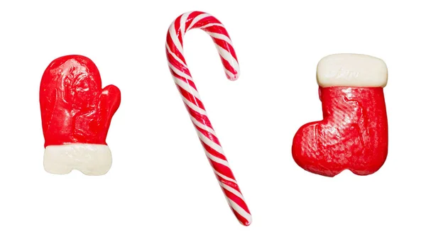 圣诞棒棒糖孤立的白色背景传统新年糖果棒棒糖棒棒棒糖手套和桑塔的靴子 — 图库照片