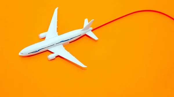 Model White Plane Flight Beautiful Orange Pastel Background Flying Contrail — Zdjęcie stockowe