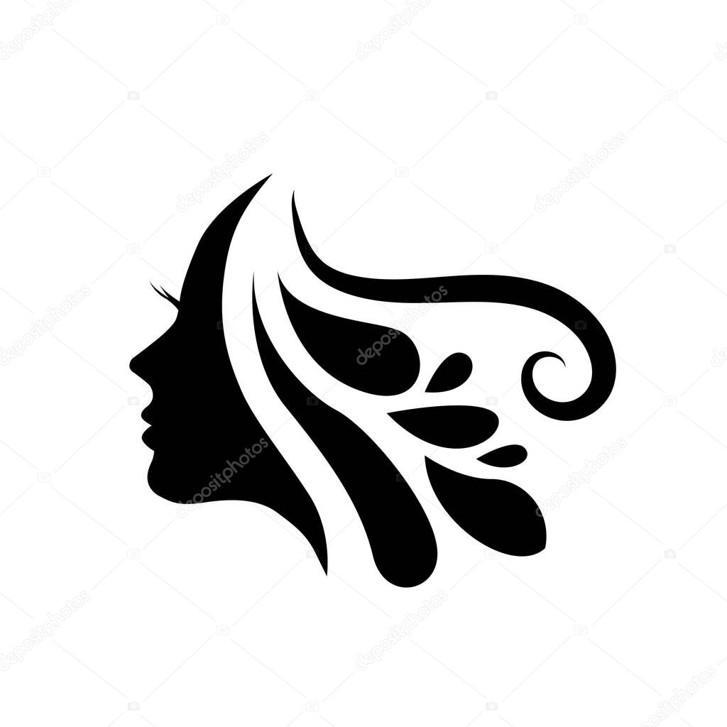 Stylized Beautiful woman's face with long hair silhouette. Women's hair salon logo or symbol.