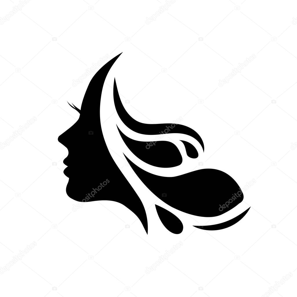 Stylized Beautiful woman's face with long hair silhouette. Women's hair salon logo or symbol.