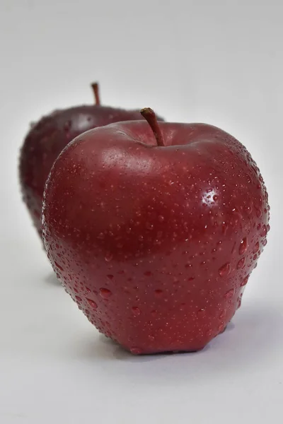 Fresh red apples on white background