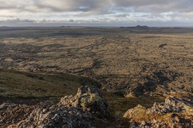Reykjanes peninsula panorama.A view from the top of the mountain orbjrn in Iceland .The mountain is beside the town of Grindavik and the Blue Lagoon