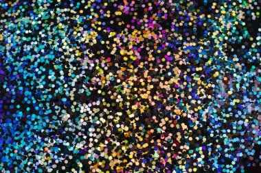 Siyah üzerine renkli altıgen konfetisi