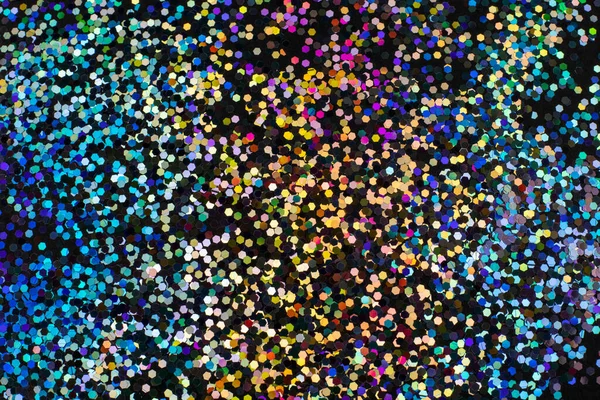 Siyah üzerine renkli altıgen konfetisi