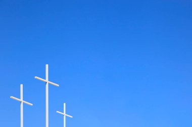 The Cross and blue sky.