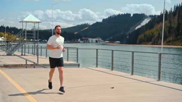 Young Man Running Fast Intense Workout Challenge Endurance Training Forest — Stockvideo