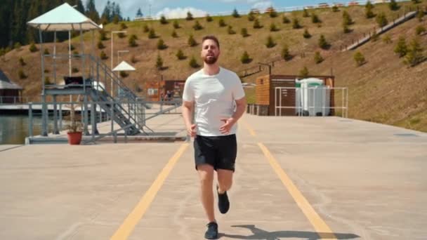 Young Man Running Fast Intense Workout Challenge Endurance Training Forest — Stockvideo