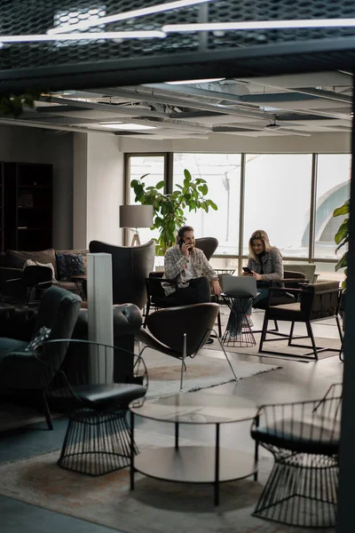 Young Attractive Office Workers Coworking Interior Discussing Work — Stock Photo, Image