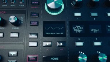 Music production studio. Music composer, sound engineer. A man works with equipment for processing and mixing sound. Music track.