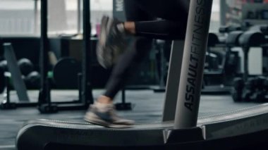 Male athlete athlete is doing cardio training on a treadmill, bodybuilder