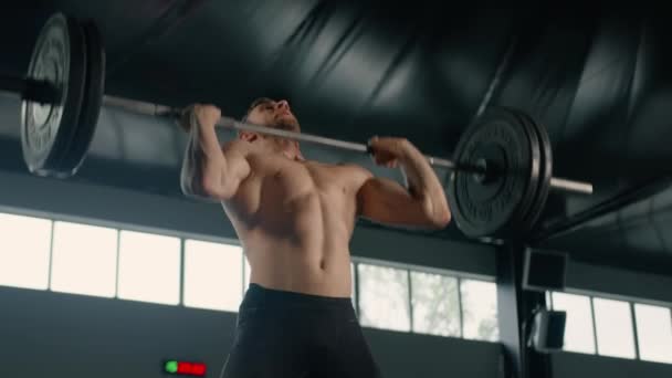 Young Male Athlete Lifts Barbell His Head Training — Vídeos de Stock