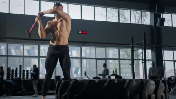 Young Male Athlete Trains Gym Hammer Crossfit Endurance — Video