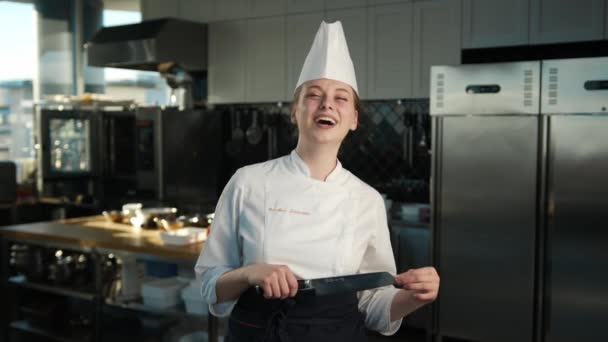 Professional Kitchen Portrait Female Chef Holding Knife Laughing Ominously — Stockvideo