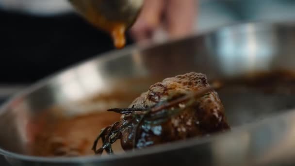 Close Chef Pouring Sauce Filet Mignon While Cooking — Vídeo de stock