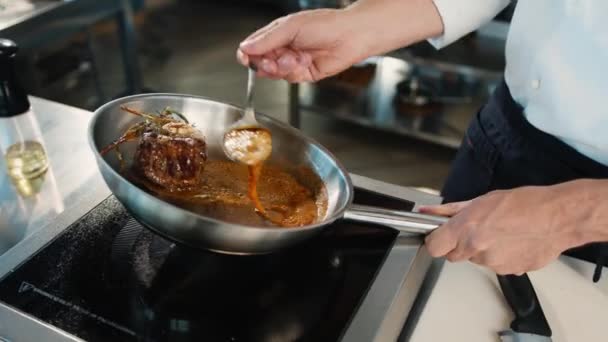 Close Chef Pouring Sauce Filet Mignon While Cooking — Vídeo de Stock