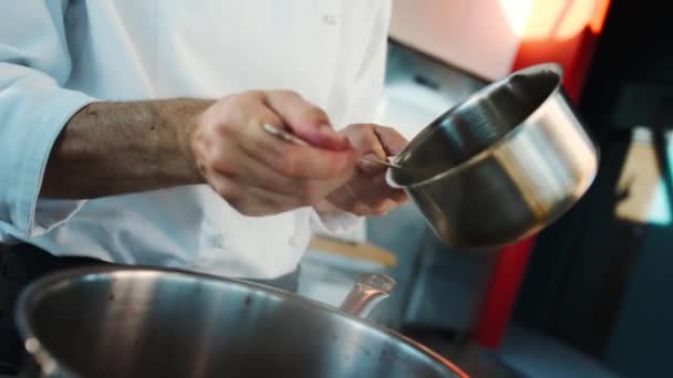Chef Makes Sauce Saucepan Professional Restaurant Kitchen Process Food Preparation — ストック動画