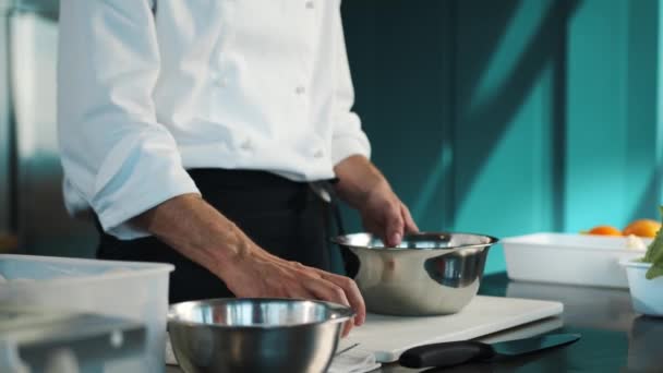 Professional Restaurant Kitchen Chef Breaks Eggs Bowl — Vídeo de Stock