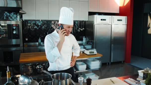 Chef Talking Phone Kitchen — Video Stock