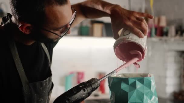Male Sculptor Handyman Creates Handmade Vase Paint Poured Object — Stok video