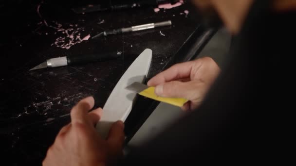 Man Arab Appearance Sharpens Blade Workshop Sculptor Painter Needleworker — Stock video