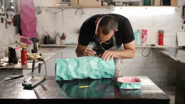 Male Artisan Sculptor Applies Solution Paint Putty Product Workshop Handmade — Stockvideo