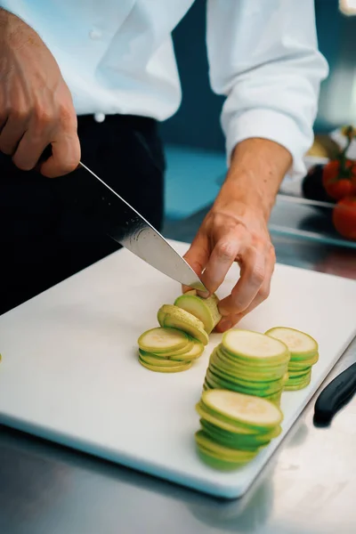 Close Chef Slicing Zucchini Professional Restaurant Kitchen —  Fotos de Stock