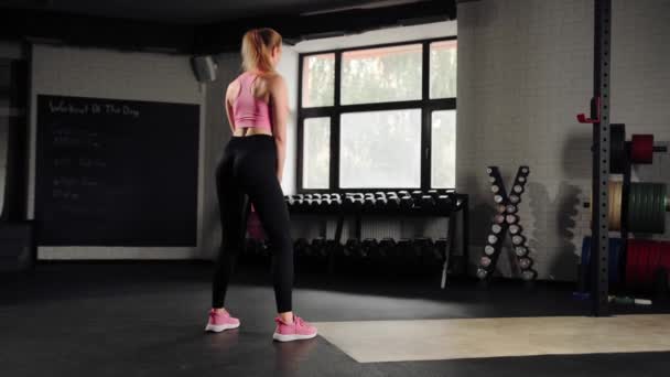 Attractive Young Beautiful Woman Doing Cardio Exercise Squatting Kettlebell Gym — Stockvideo