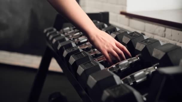 Girl Athlete Takes Dumbbell Style Dumbbells Gym — Stockvideo