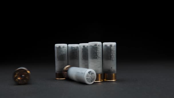 Close Shotgun Shells Table Dark Background One Cartridge Rolled Frame — Stock Video